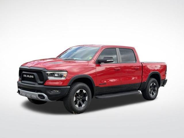 2020 RAM 1500 Rebel in Flame Red Clear — front three-quarter view