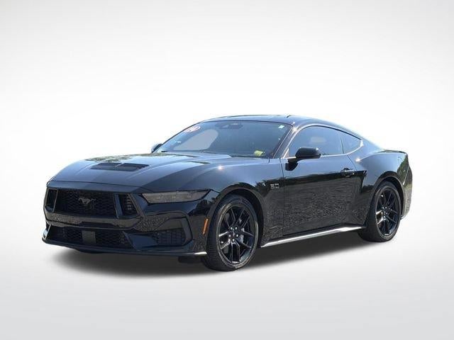 2024 Ford Mustang GT in Black — front three-quarter view