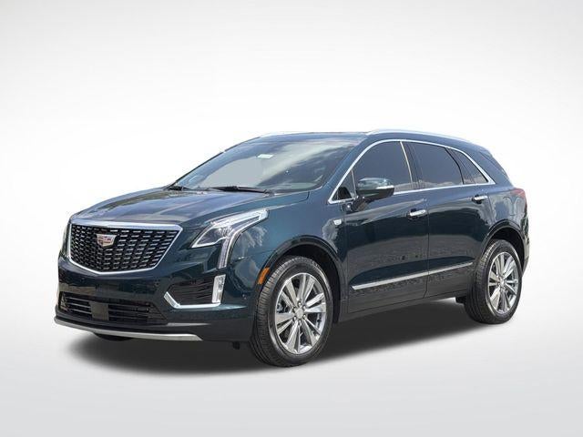 2026 Cadillac XT5 Premium Luxury in Emerald Lake Metallic — front three-quarter view