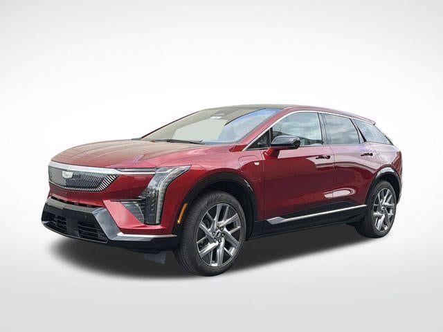 2026 Cadillac OPTIQ Luxury in Radiant Red Tintcoat — front three-quarter view