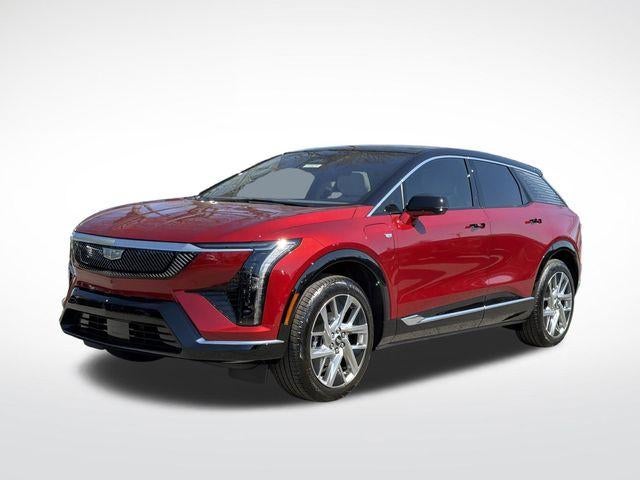 2026 Cadillac OPTIQ Luxury in Radiant Red Tintcoat — front three-quarter view