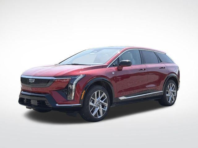 2026 Cadillac OPTIQ Premium Luxury in Radiant Red Tintcoat — front three-quarter view